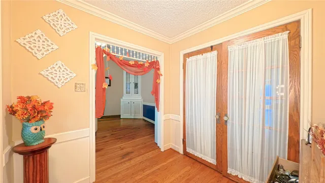 a view of entryway with wooden floor