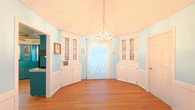 a view of a room with a wardrobe space