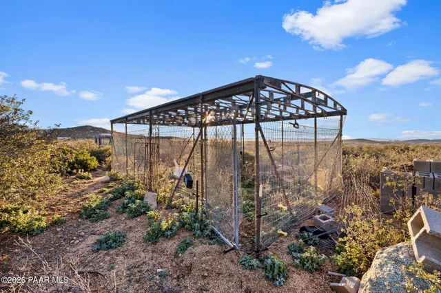 an aerial view of houses with yard