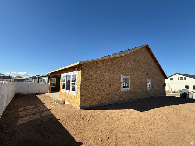 2227 Fortune Lane, Unit 448 Mapleton, UT 84664 - Photo 2 of 4 View of side of property with a fenced backyard