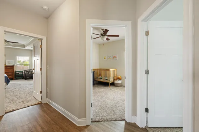 a view of a bedroom from a hallway