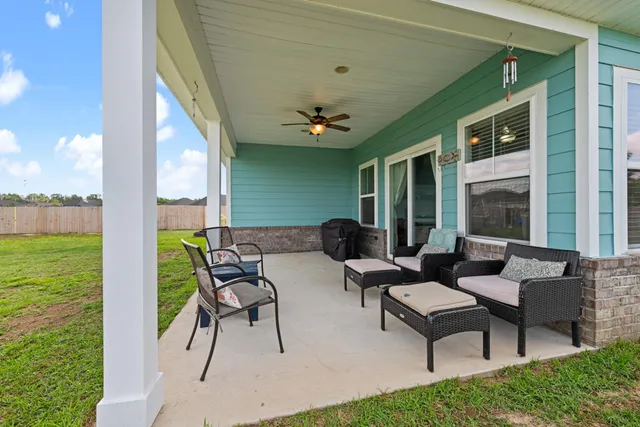 a outdoor living space with furniture and garden view