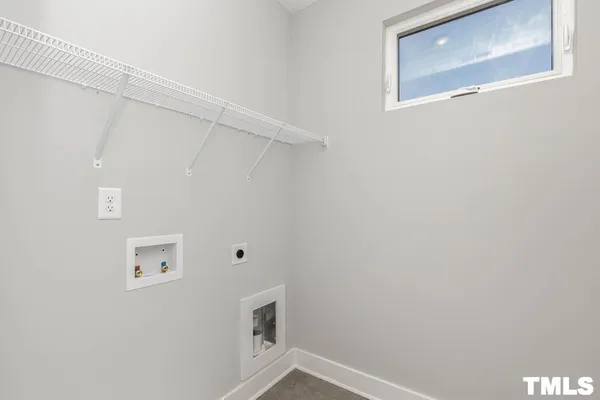 a kitchen with stainless steel appliances a white stove top oven and sink