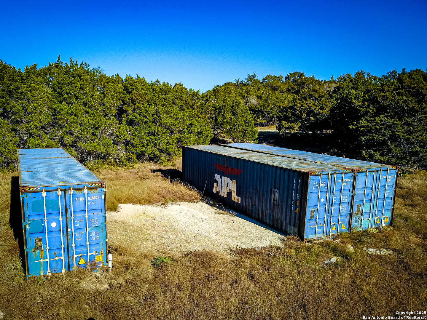 1205 Elm Creek Road Medina, TX 78055 - Photo 7 of 9 a view of a house with wooden fence