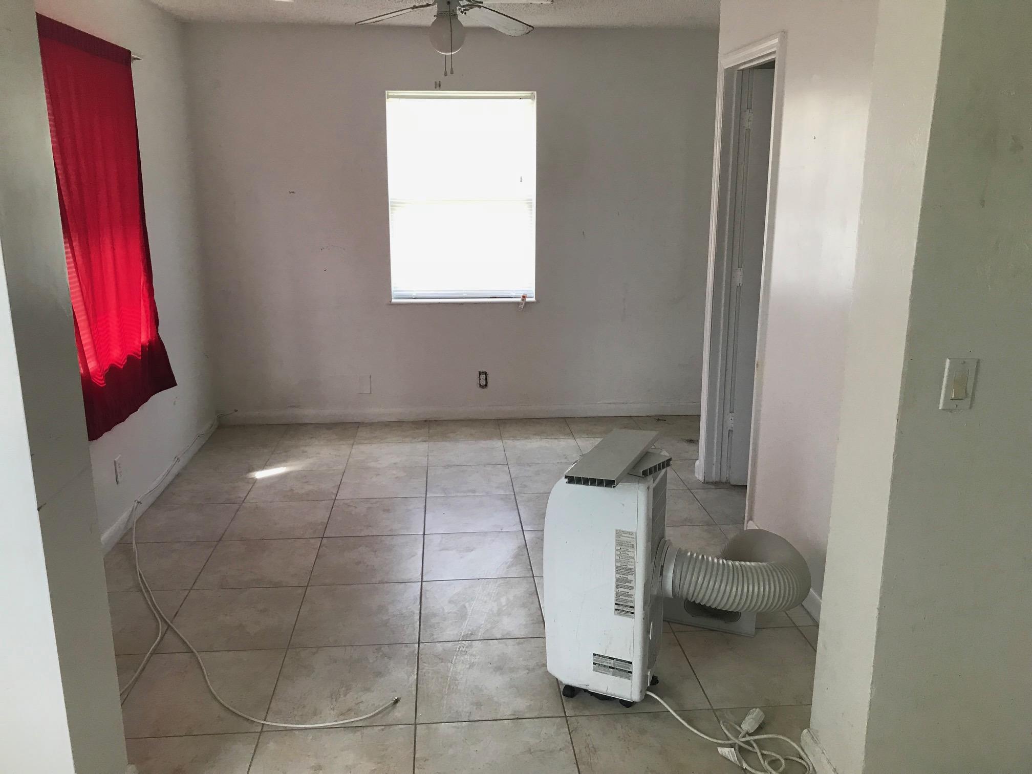 1228 West 6th Street Riviera Beach, FL 33404 - Photo 7 of 8 12286tstrpicfamilyroomoffofkitchen