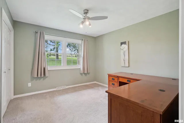 a room with furniture and window