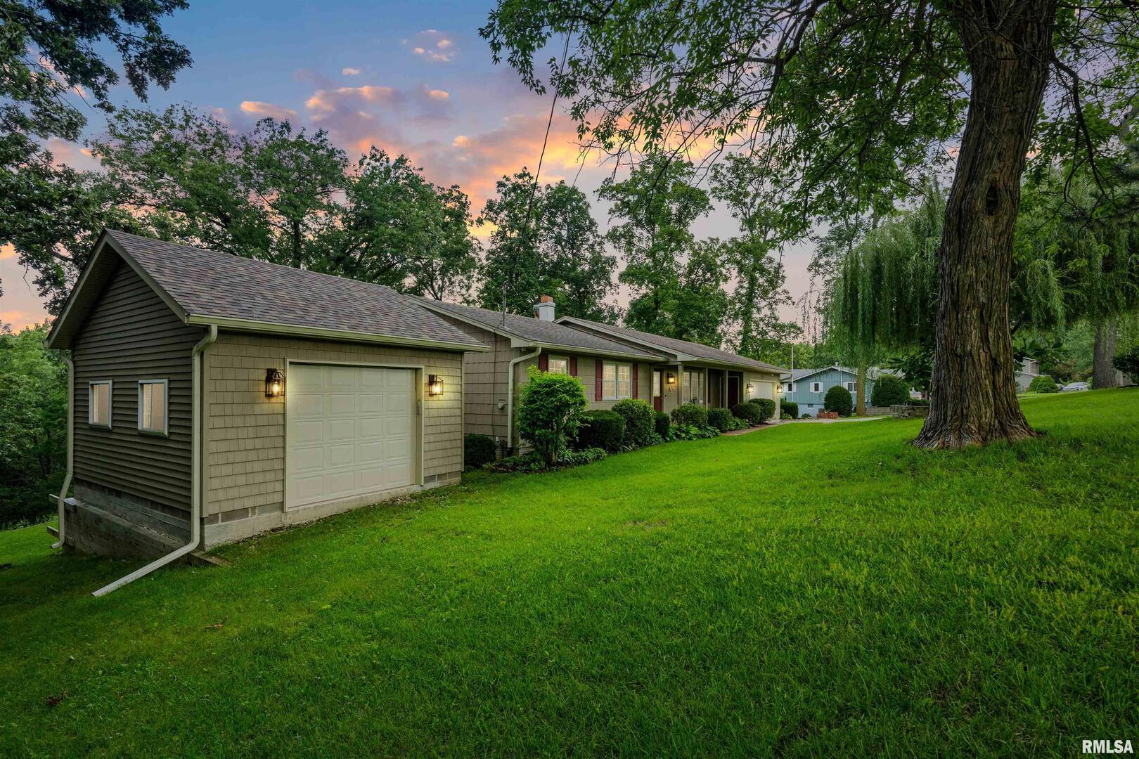 8528 101st Street West Andalusia, IL 61232 - Photo 2 of 42 a view of a house with a yard