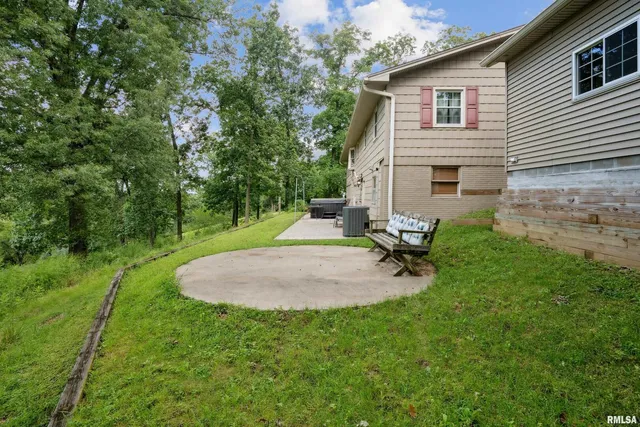 a view of backyard with a barn