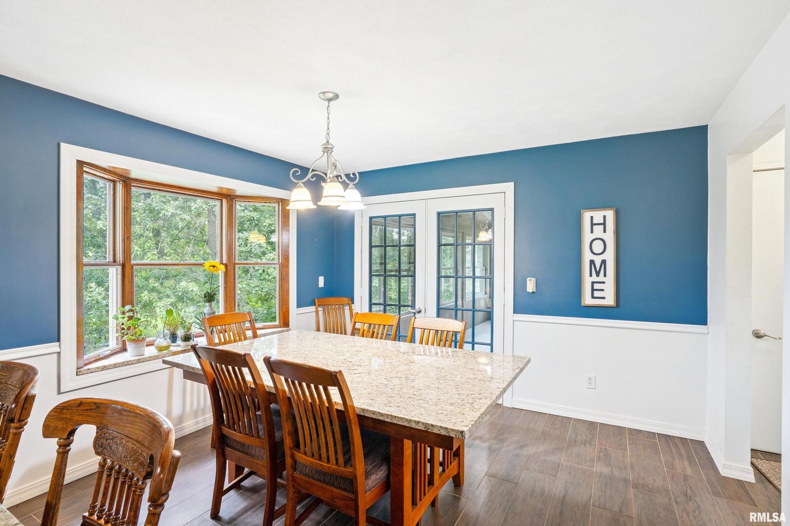 8528 101st Street West Andalusia, IL 61232 - Photo 9 of 42 a view of a dining room with furniture window and outside view