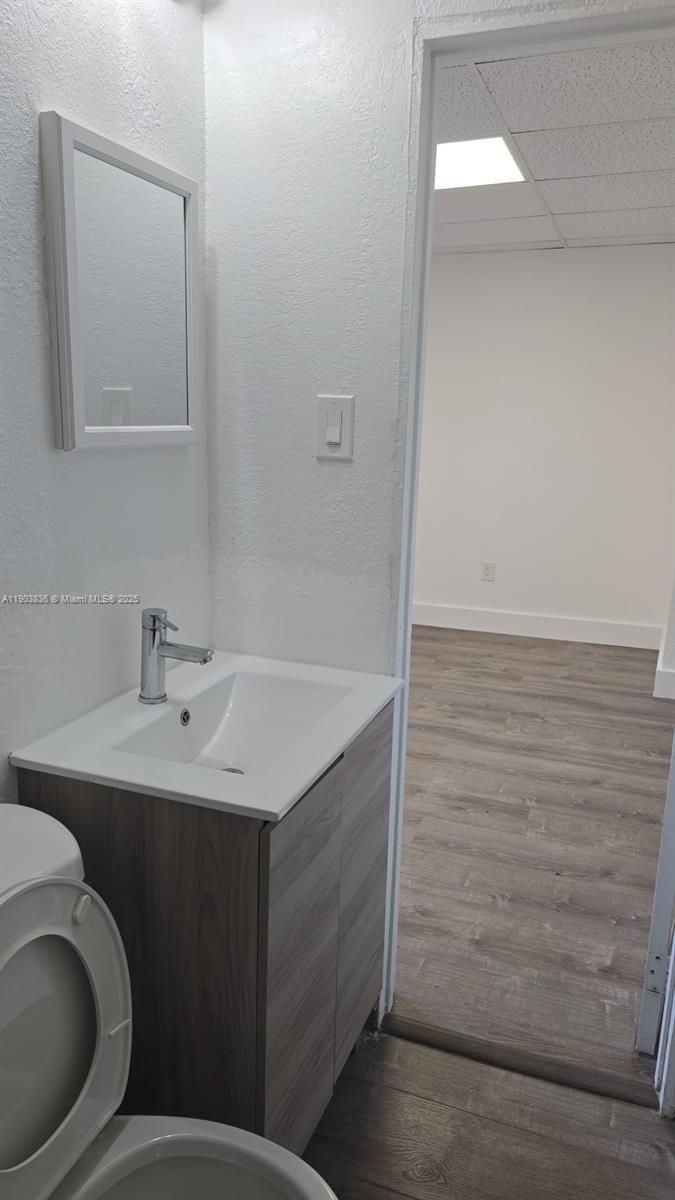 5655 Johnson Street, Unit 5 Hollywood, FL 33021 - Photo 5 of 8 a bathroom with a sink and a toilet
