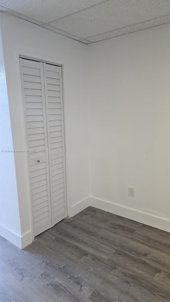 5655 Johnson Street, Unit 5 Hollywood, FL 33021 - Photo 7 of 8 wooden floor in an empty room