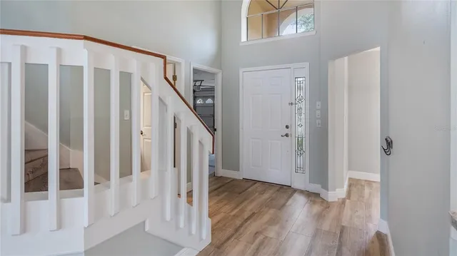 a view of an entryway with staircase