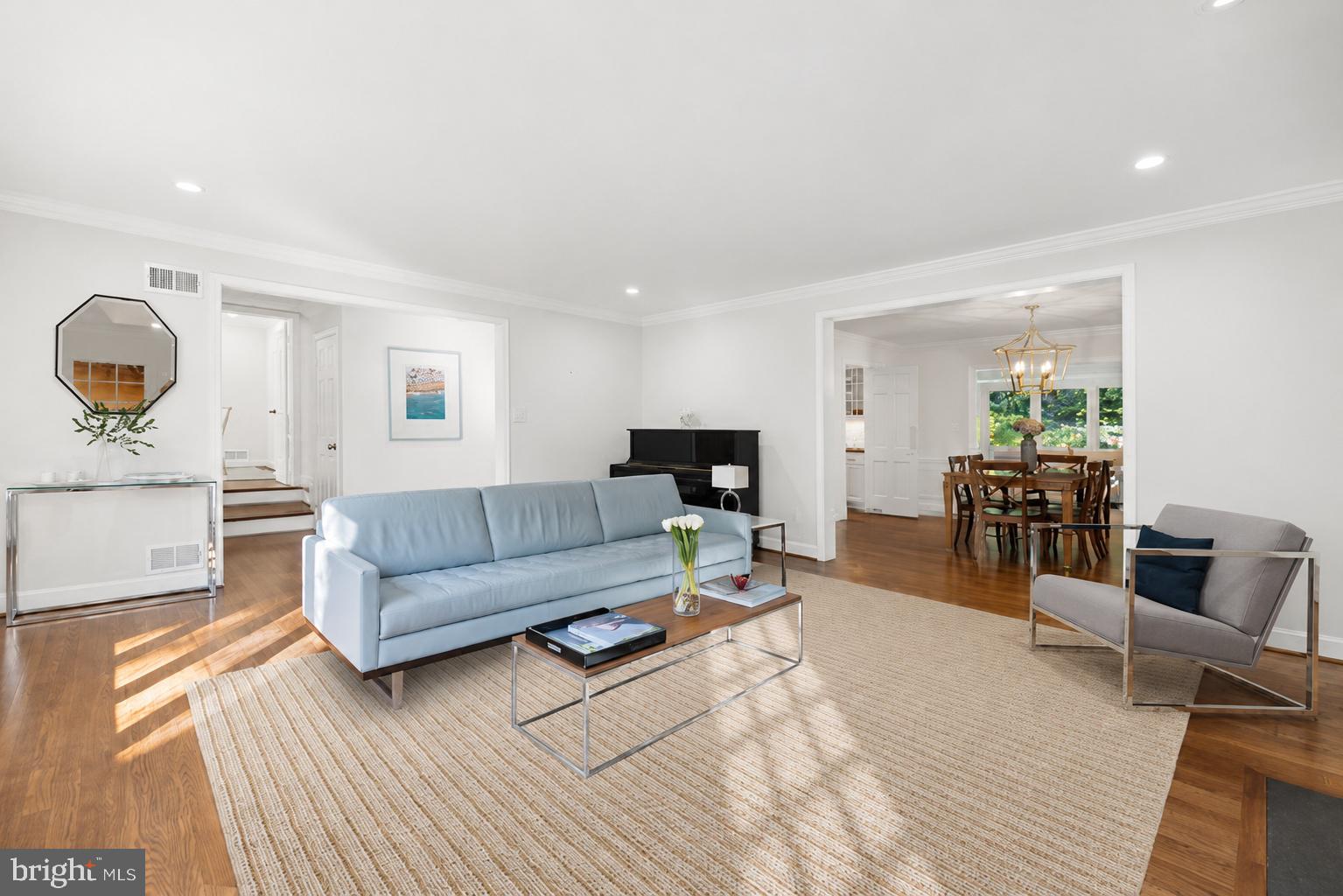 4555 W Street Northwest Washington, DC 20007 - Photo 11 of 34 a living room with furniture and a wooden floor