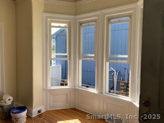 424 Union Avenue, Unit 424 Bridgeport, CT 06607 - Photo 2 of 14 a view of a room that has a window and chair