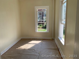 424 Union Avenue, Unit 424 Bridgeport, CT 06607 - Photo 5 of 14 a view of an empty room and window