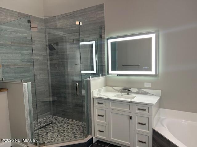 112 Laterra Links Circle, Unit 201 St. Augustine, FL 32092 - Photo 17 of 21 a bathroom with a shower sink and mirror