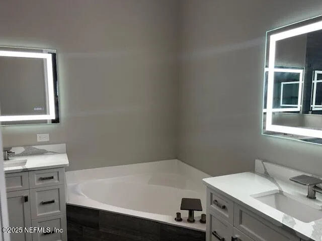 a bathroom with a sink and a bathtub