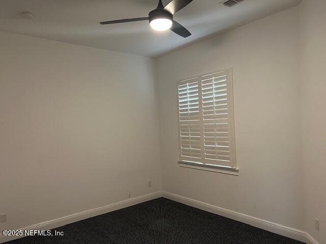 112 Laterra Links Circle, Unit 201 St. Augustine, FL 32092 - Photo 19 of 21 an empty room with a window and a fan