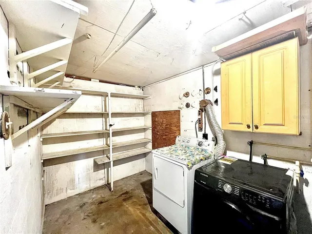 a view of utility room and windows