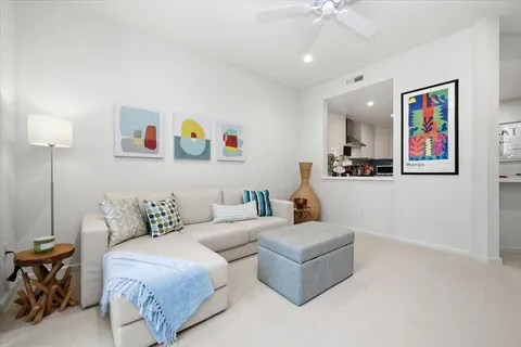 a living room with furniture and a couch