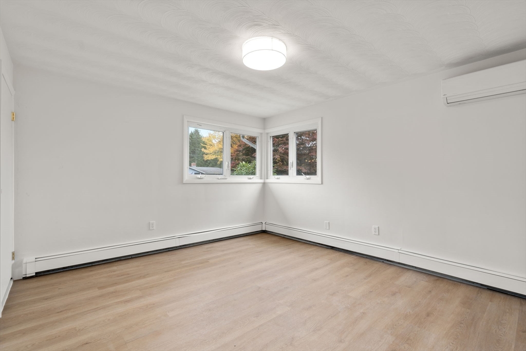 8 Clara Road Framingham, MA 01701 - Photo 13 of 41 an empty room with a window
