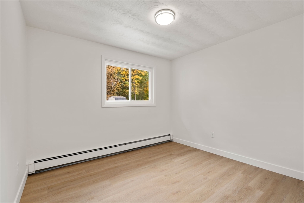 8 Clara Road Framingham, MA 01701 - Photo 17 of 41 an empty room with a window