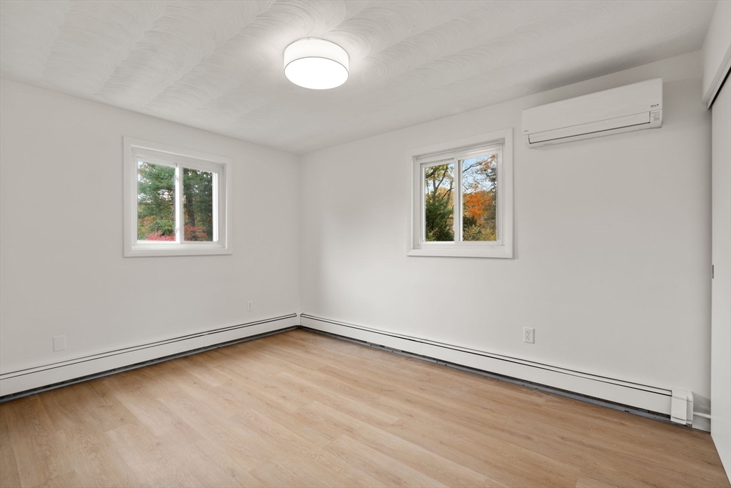8 Clara Road Framingham, MA 01701 - Photo 19 of 41 an empty room with a window