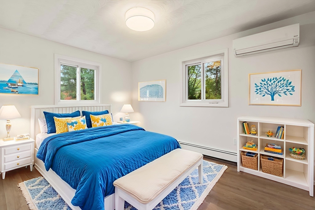 8 Clara Road Framingham, MA 01701 - Photo 20 of 41 a bedroom with a bed and a table