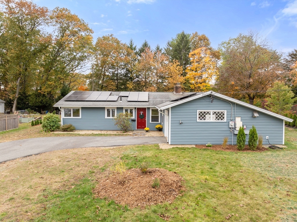8 Clara Road Framingham, MA 01701 - Photo 23 of 41 a front view of a house with a garden