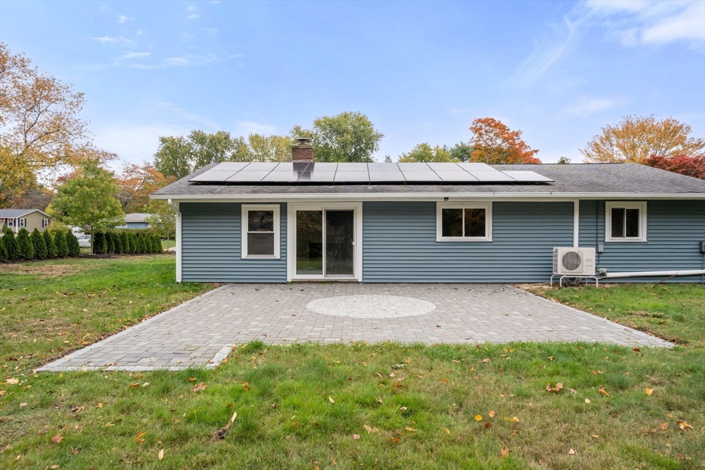 8 Clara Road Framingham, MA 01701 - Photo 26 of 41 a front view of house with yard and green space