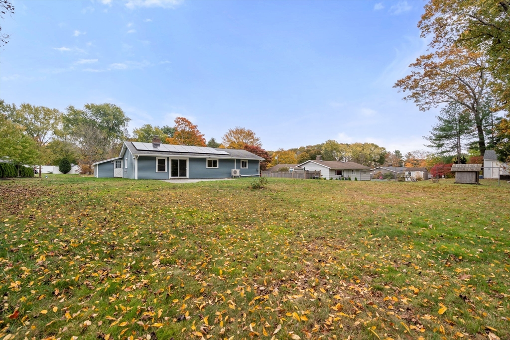 8 Clara Road Framingham, MA 01701 - Photo 30 of 41 a front view of house with yard and trees around