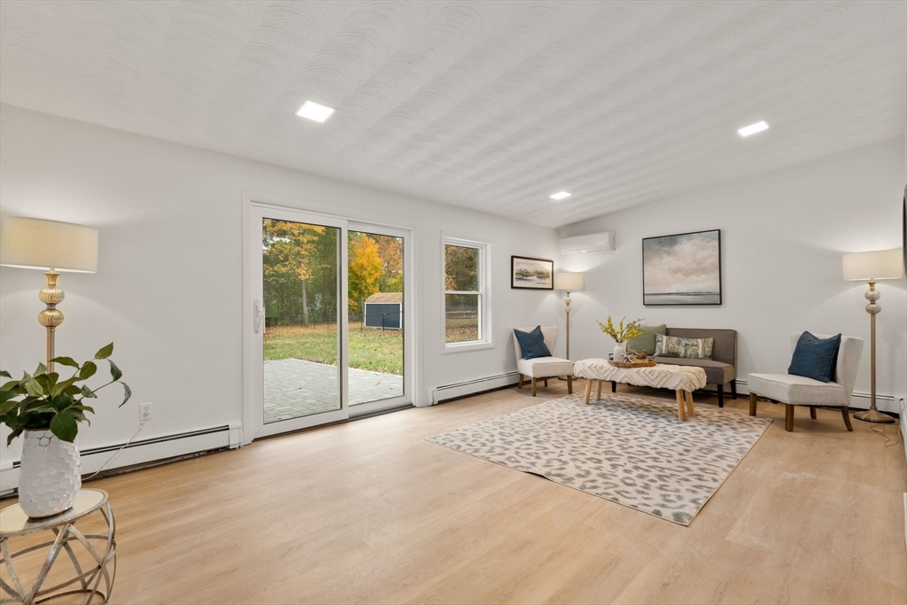 8 Clara Road Framingham, MA 01701 - Photo 6 of 41 a living room with furniture and a window