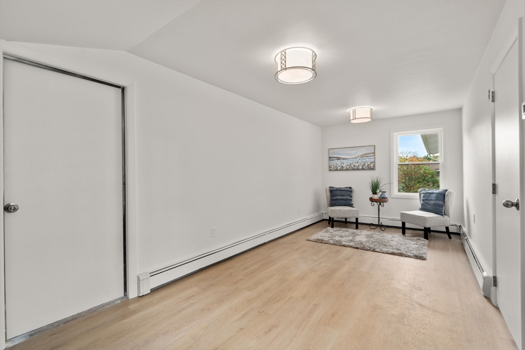 8 Clara Road Framingham, MA 01701 - Photo 10 of 41 a living room with furniture and window