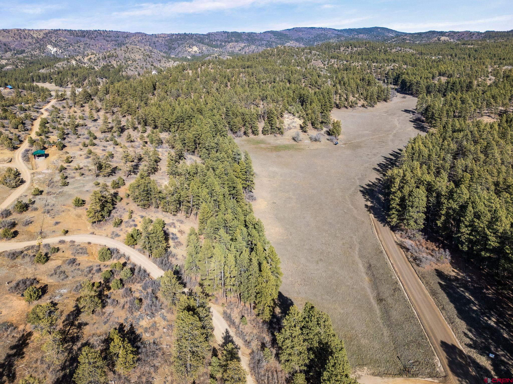 5561 County Road 228 Durango, CO 81301 - Photo 18 of 20 a view of a lake with mountains in the background