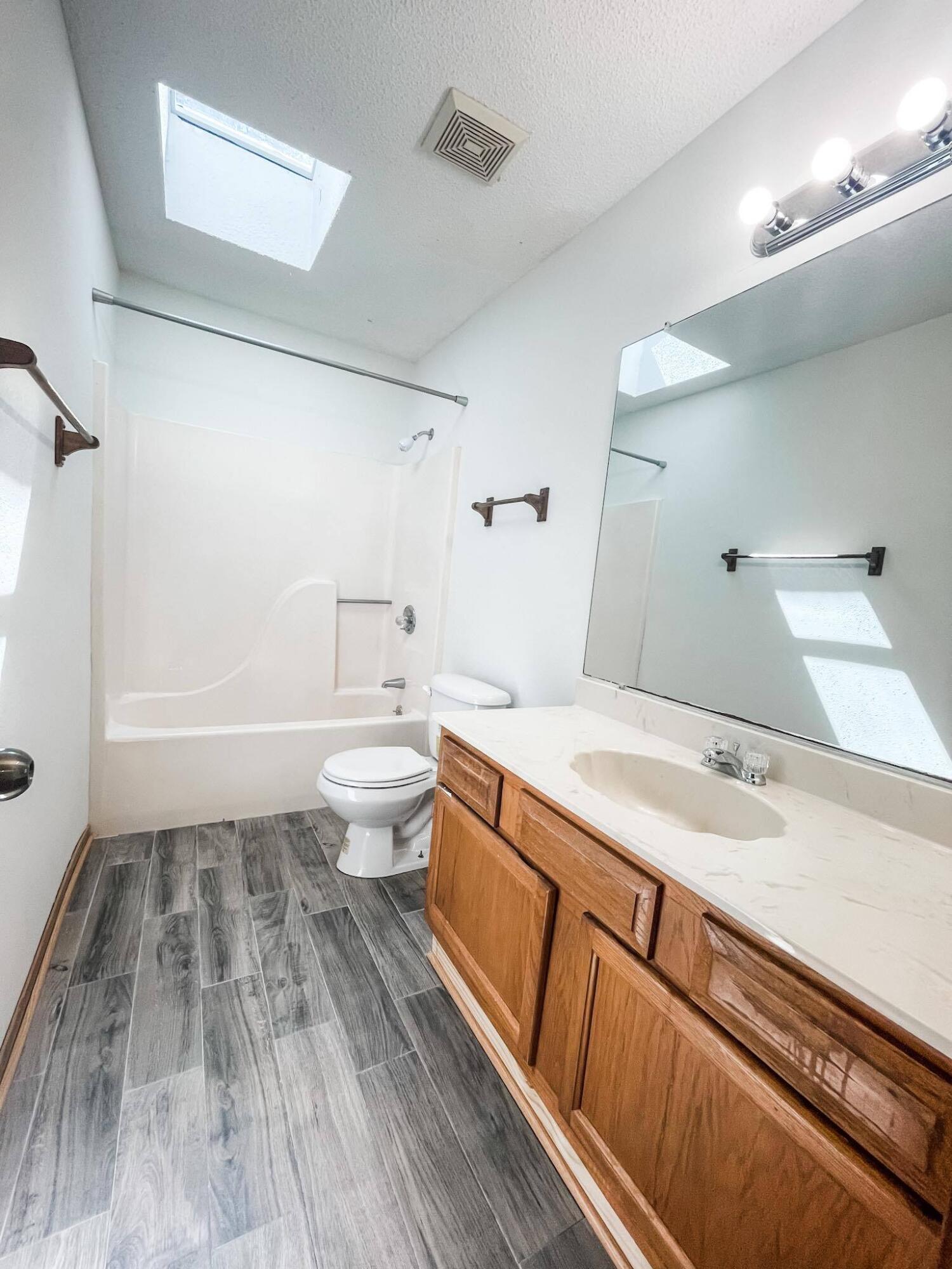 888 Culp Avenue, Unit 3 Fort Walton Beach, FL 32547 - Photo 12 of 12 a bathroom with a sink and a toilet