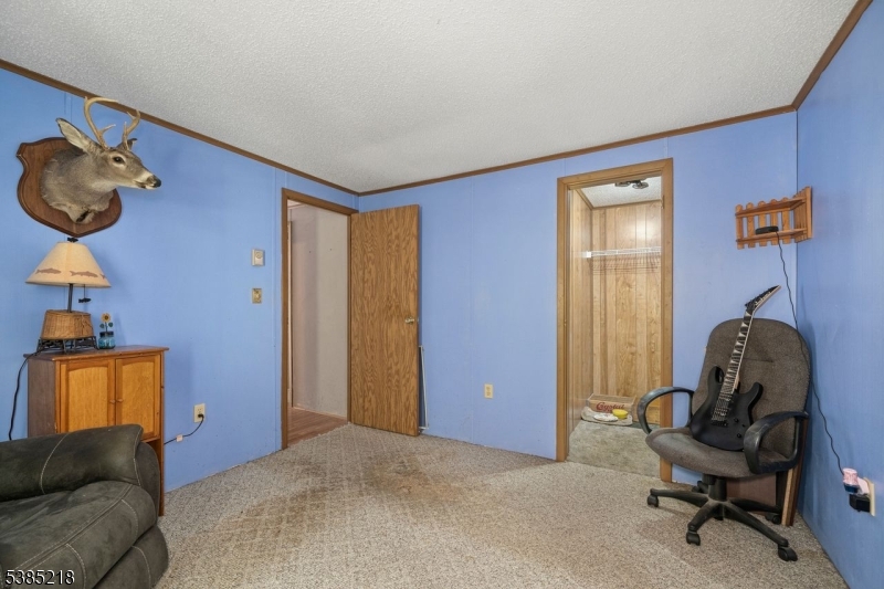 126 Armstrong Road Montague, NJ 07827 - Photo 18 of 28 a living room with furniture and a window