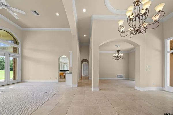 a kitchen with stainless steel appliances granite countertop a sink and cabinets