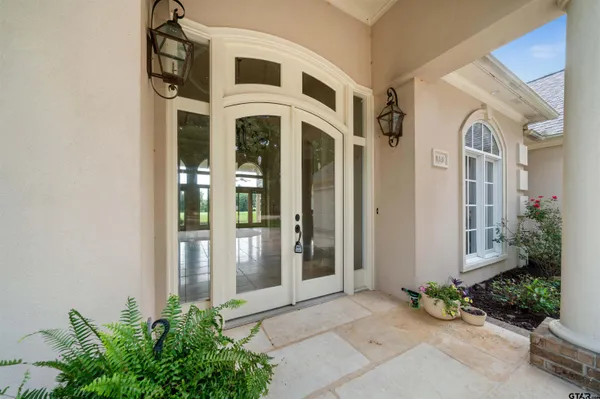 a view of an entryway with a chandelier