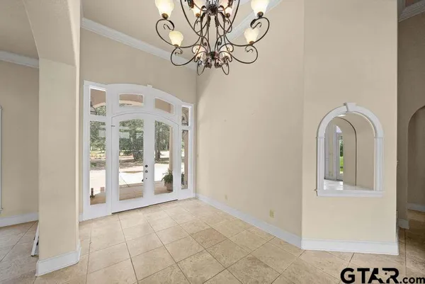 a view of a kitchen with a sink and a fireplace