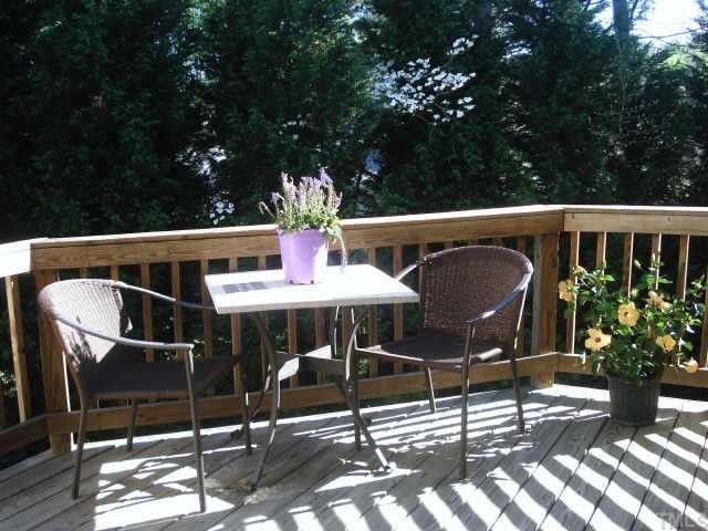 7204 Doverton Court Raleigh, NC 27615 - Photo 4 of 10 a view of a chairs and table in the patio