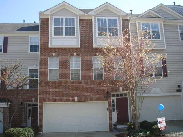 7204 Doverton Court Raleigh, NC 27615 - Photo 5 of 10 a front view of a house with street