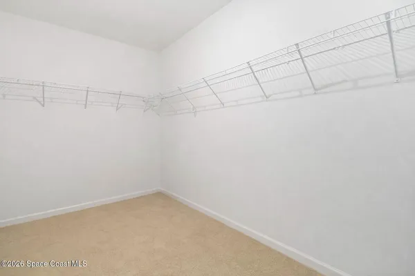 a view of swimming pool from a balcony