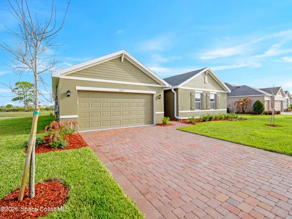 a view of a kitchen with a sink and a stove top oven