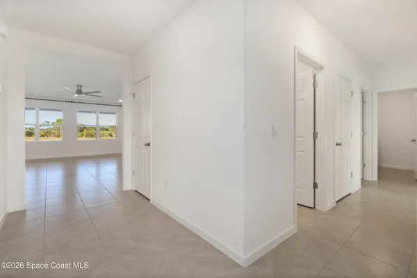a kitchen with kitchen island a sink stainless steel appliances and cabinets