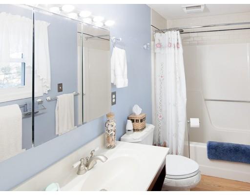 1 Long Boat Road Bourne, MA 02532 - Photo 16 of 29 a bathroom with a sink and a mirror