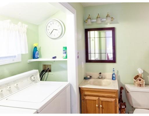1 Long Boat Road Bourne, MA 02532 - Photo 22 of 29 a bathroom with a sink and a mirror