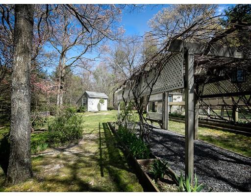 1 Long Boat Road Bourne, MA 02532 - Photo 24 of 29 a view of a house with large trees