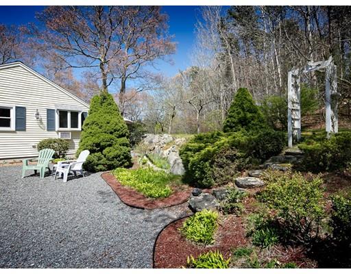 1 Long Boat Road Bourne, MA 02532 - Photo 28 of 29 a view of a backyard with sitting area and garden