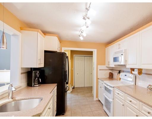 1 Long Boat Road Bourne, MA 02532 - Photo 6 of 29 a kitchen with a refrigerator and a sink