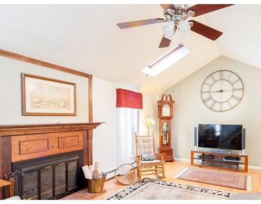 1 Long Boat Road Bourne, MA 02532 - Photo 10 of 29 a view of a livingroom with furniture and a flat screen tv